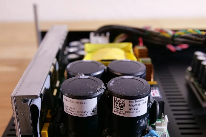 a couple of batteries sitting on top of a motherboard